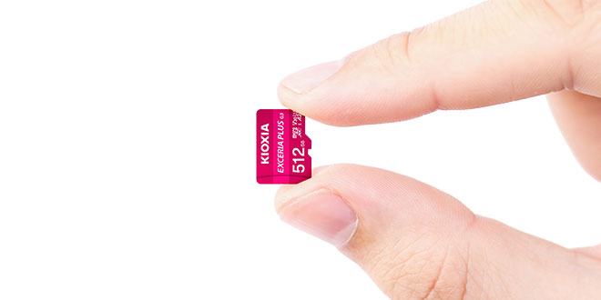 A hand holding the EXCERIA PLUS G3 microSD memory card