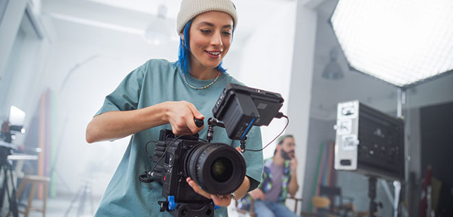 A happy professional video/photographer